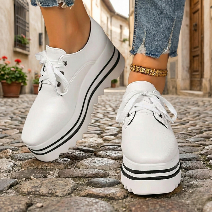 White Elara women's platform oxford dress shoes. Comfortable lace-up orthopedic design for elegant casual & office wear.