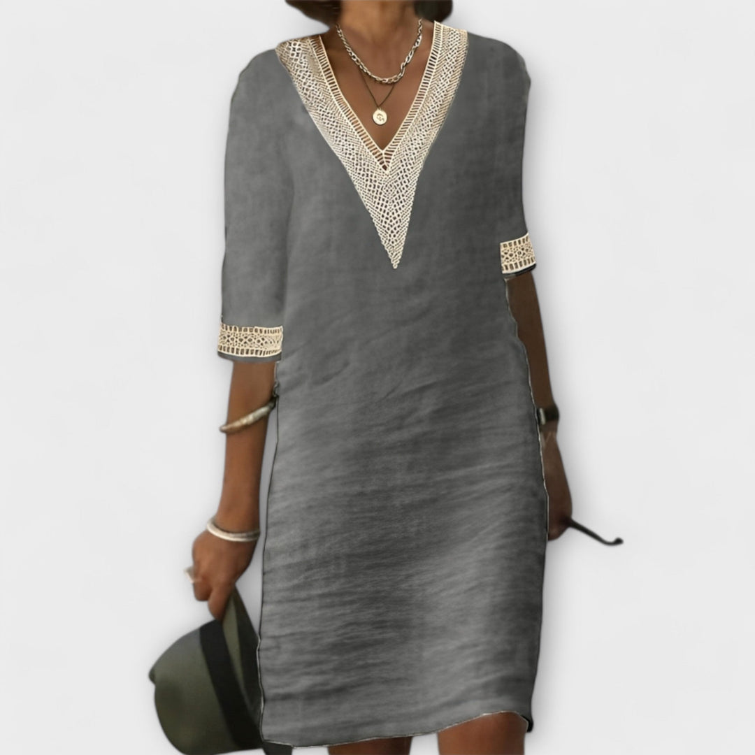 Women's elegant openwork crochet midi dress, designed for flowy comfort & versatile casual or vacation wear.
