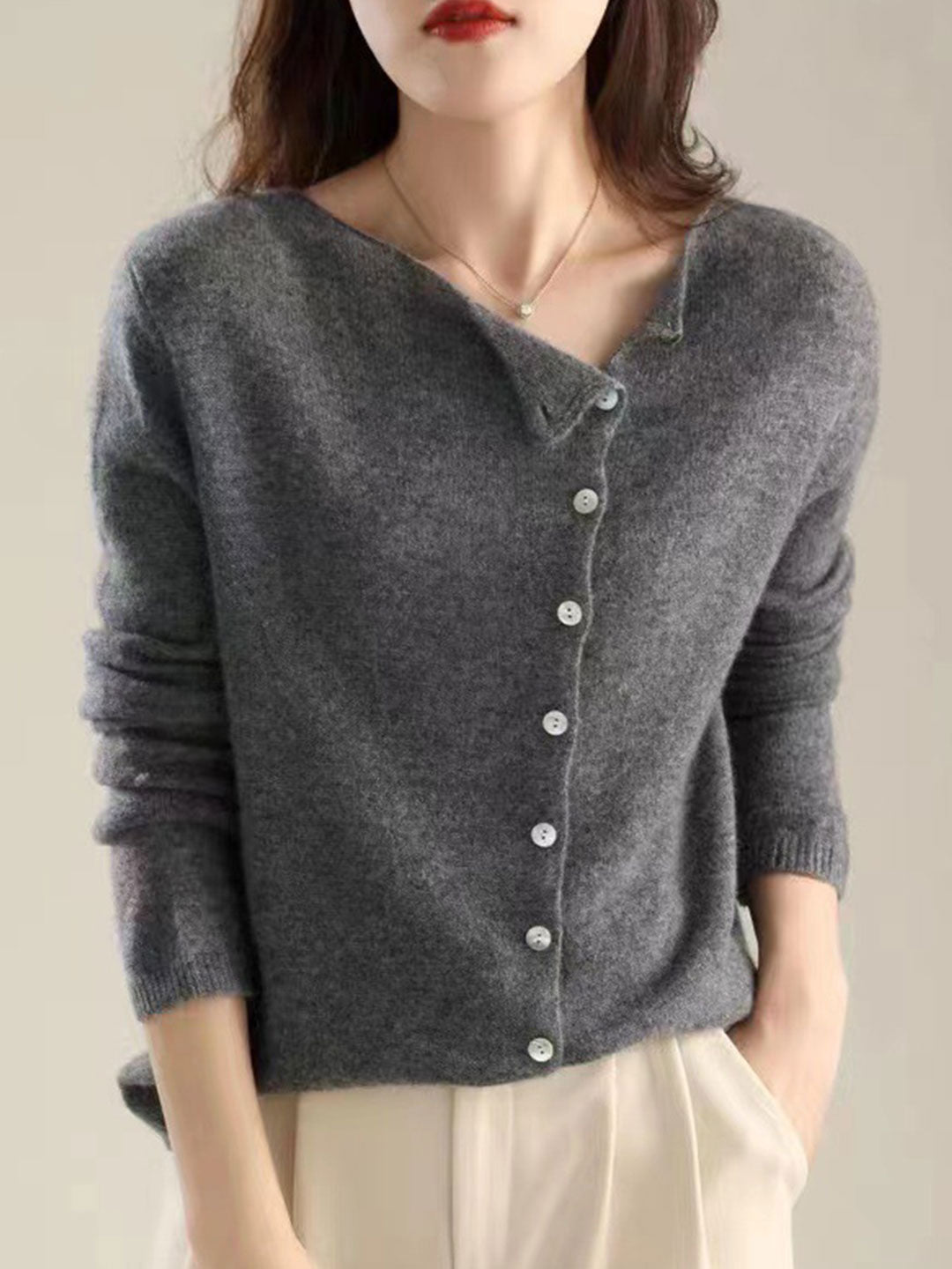 Chic women's cozy cardigan. Relaxed fit knitwear, an elegant layering piece for everyday style.