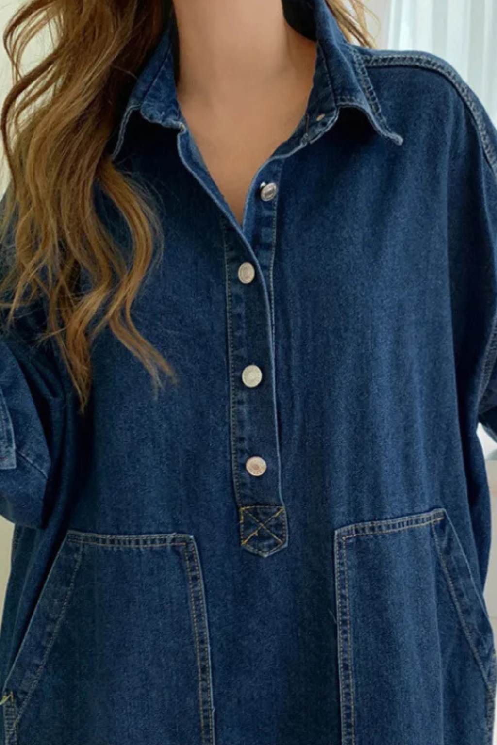 Casual women's blue maxi shirt dress, oversized fit with full button closure, collar, and side pockets.