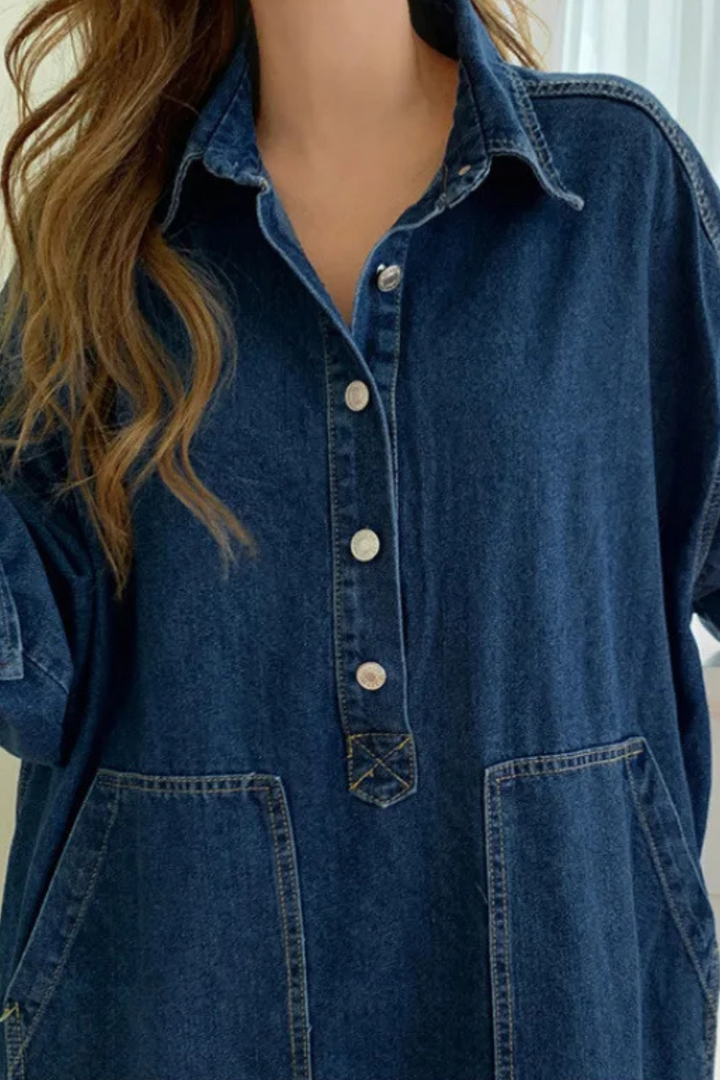 Casual women's blue maxi shirt dress, oversized fit with full button closure, collar, and side pockets.
