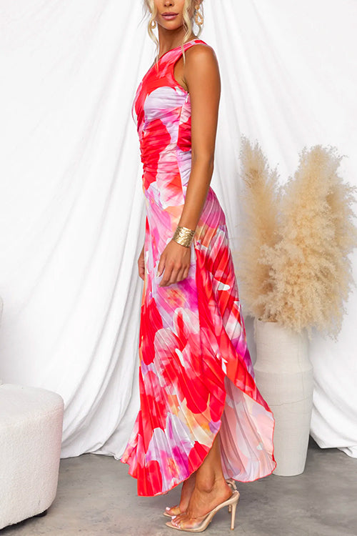 Beautiful women's pleated maxi dress with intricate floral pattern for elegant wedding guests.