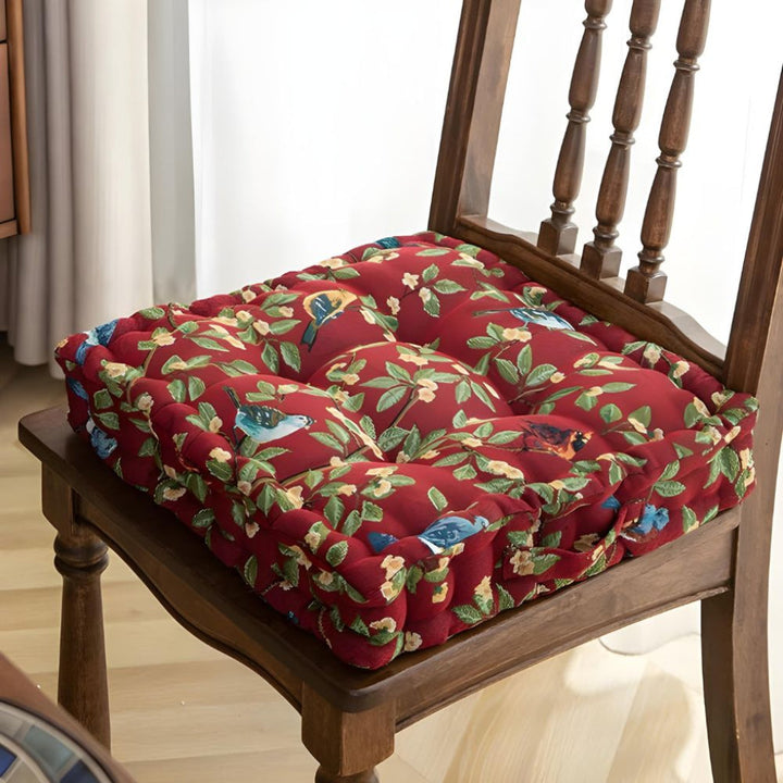 Comfortable polyester padded seat cushion with ties, perfect for dining, kitchen, or outdoor patio chairs.