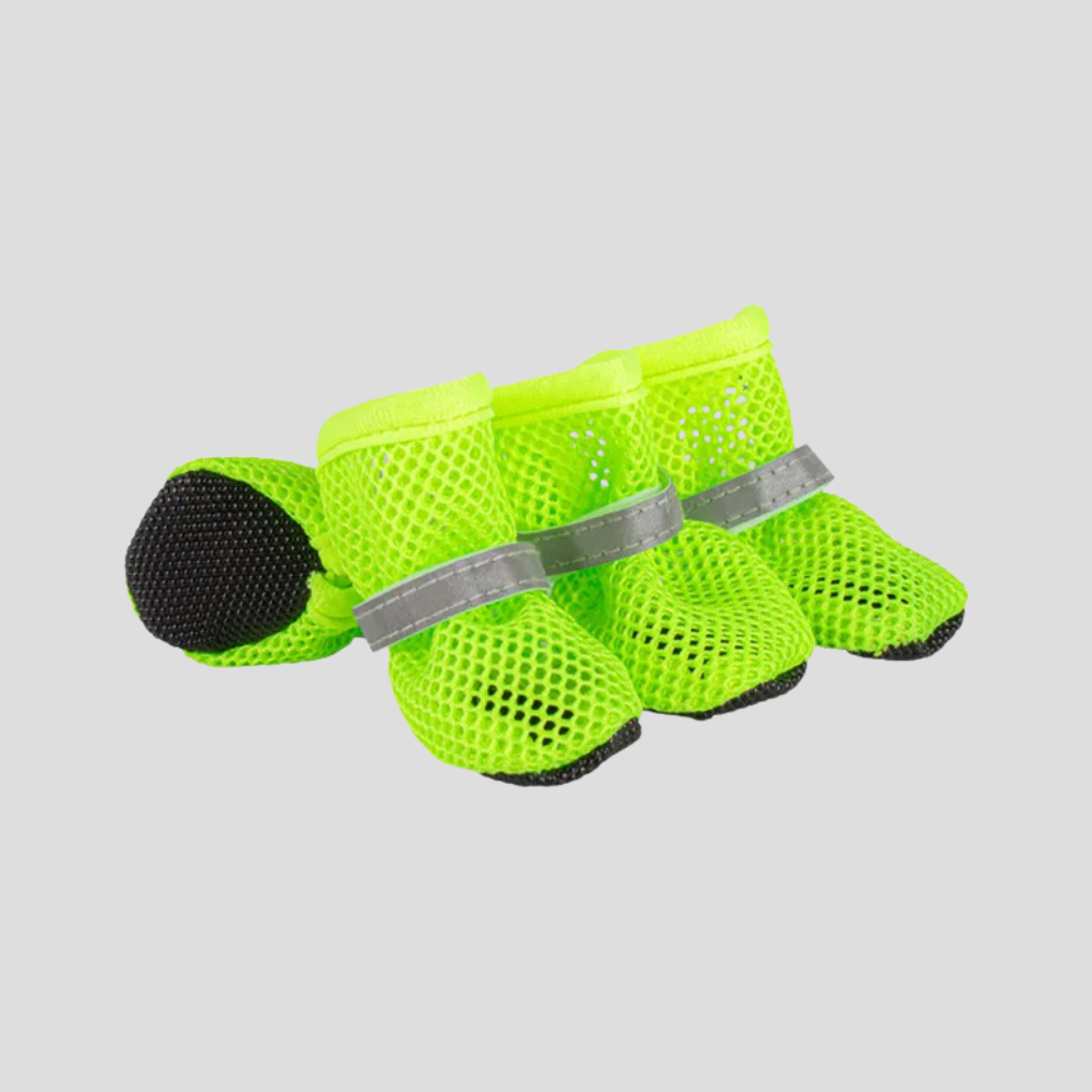 Comfortable pet booties for dogs & cats, providing paw protection & anti-slip grip on various surfaces.