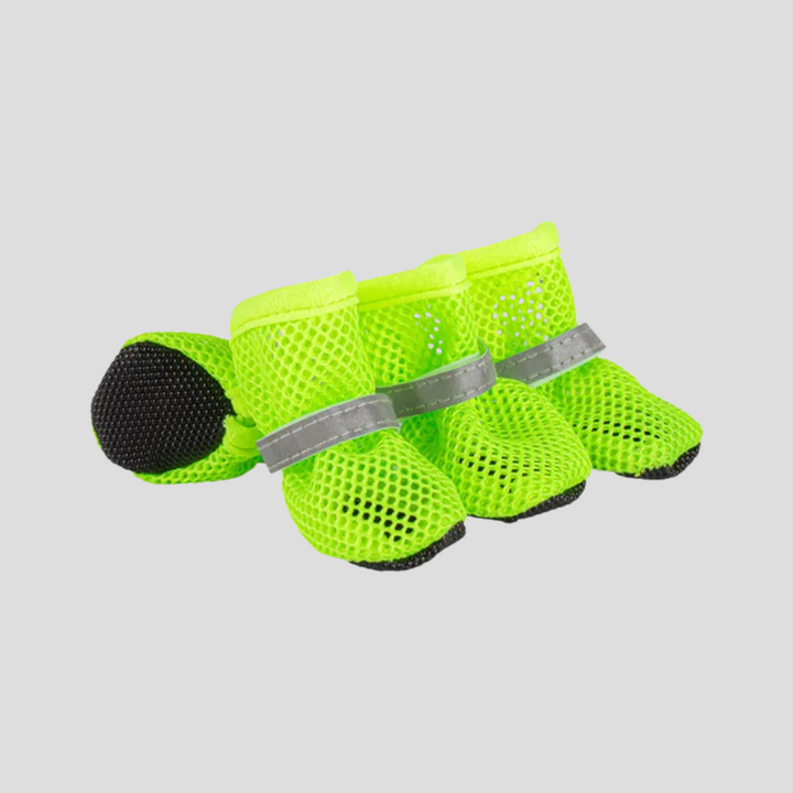 Comfortable pet booties for dogs & cats, providing paw protection & anti-slip grip on various surfaces.