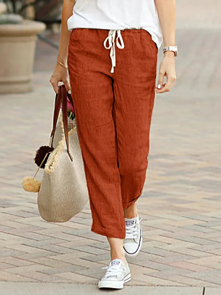 Fashionable women's loose-fit cropped trousers, straight leg & elegant, perfect all-season casual or office style.
