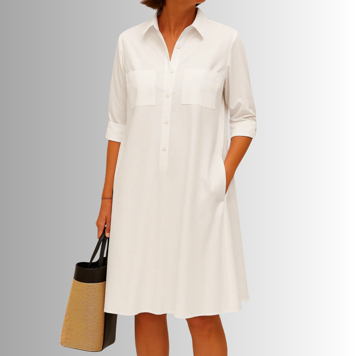 Versatile women's button-front A-line dress with practical pockets and stylish 3/4 sleeves, ideal for spring.