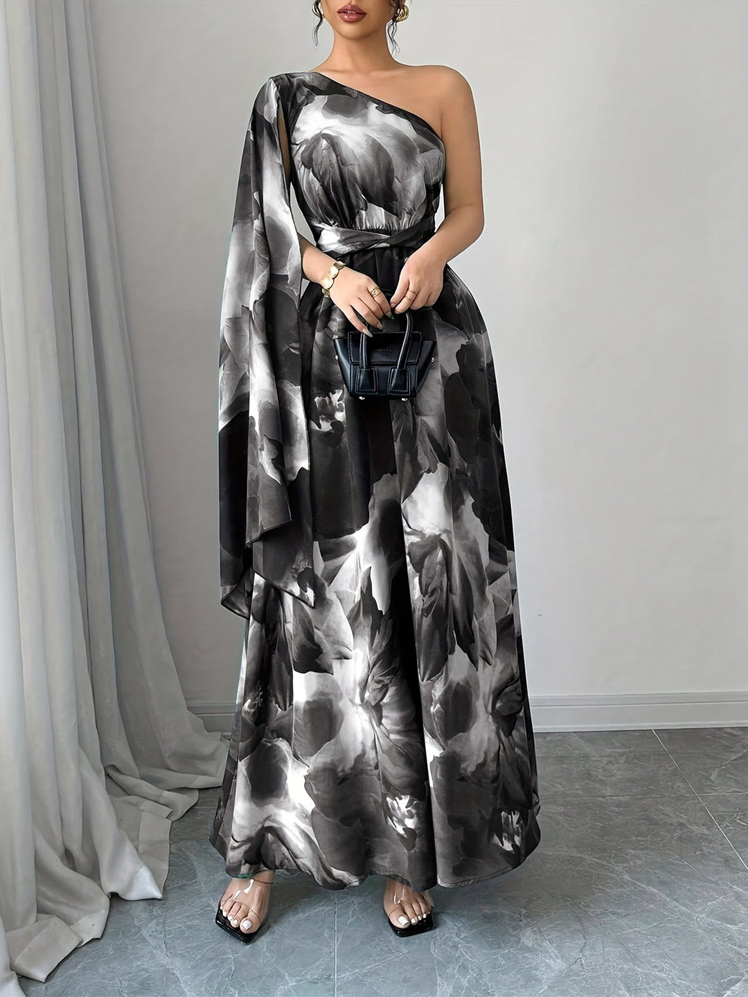 Elegant Women's Floral Maxi Dress with one shoulder. Stunning and chic for any special occasion.