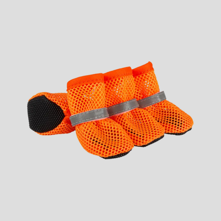 Set of anti-slip paw protector shoes for dogs & cats in various sizes, offering superior grip & protection.