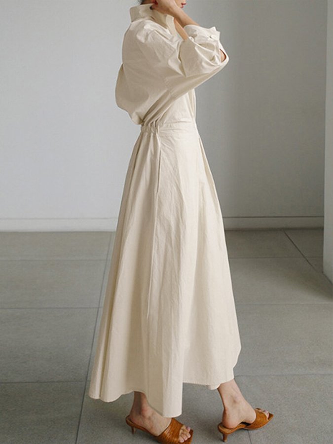 Sophisticated women's long sleeve collared midi dress, offering elegant style for work, casual, & fall/winter.