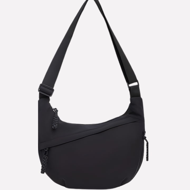 Unique crescent-shaped crossbody bag for women, a fashionable & practical nylon purse.