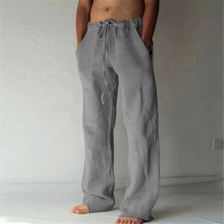 Relaxed fit men's lounge pants, wide-leg style. High-waist with functional drawstring for easy, everyday wear.