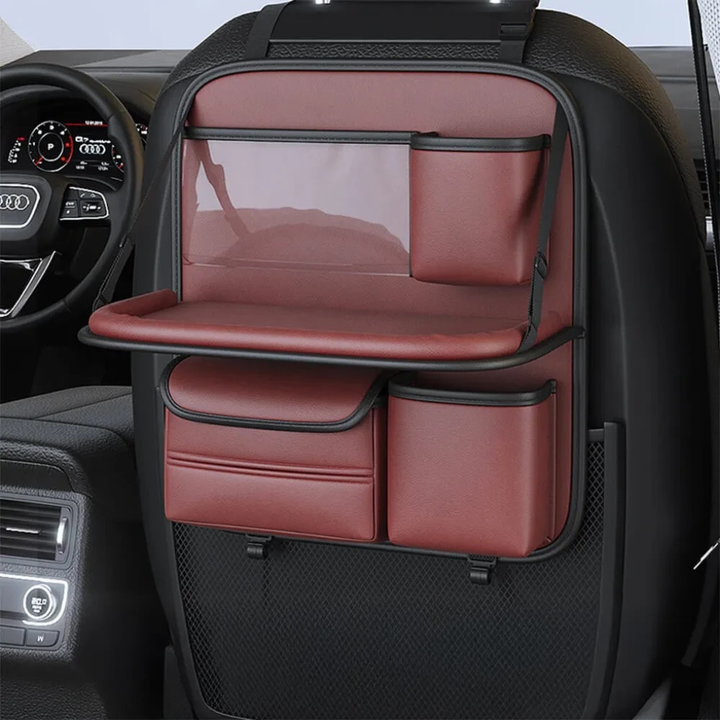 Vehicle back-seat organizer with clear tablet holder and multi-compartment storage pockets.