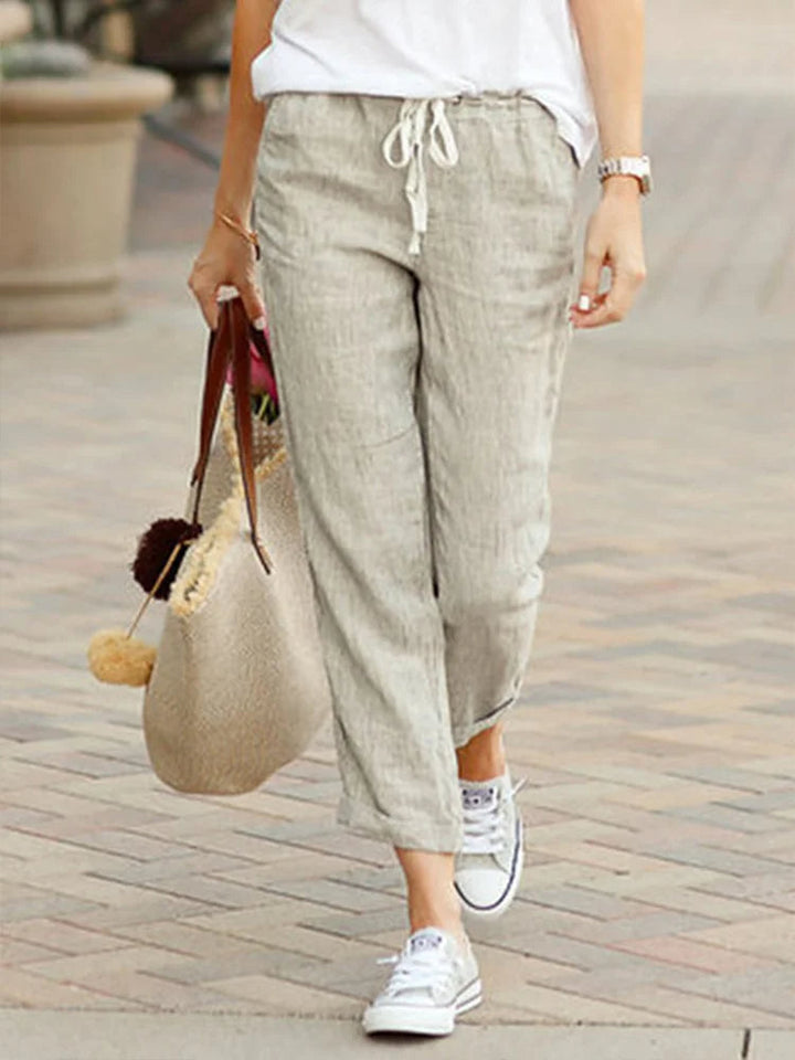 Elegant women's straight-leg cropped trousers for versatile fashion, comfortable for office and casual occasions.