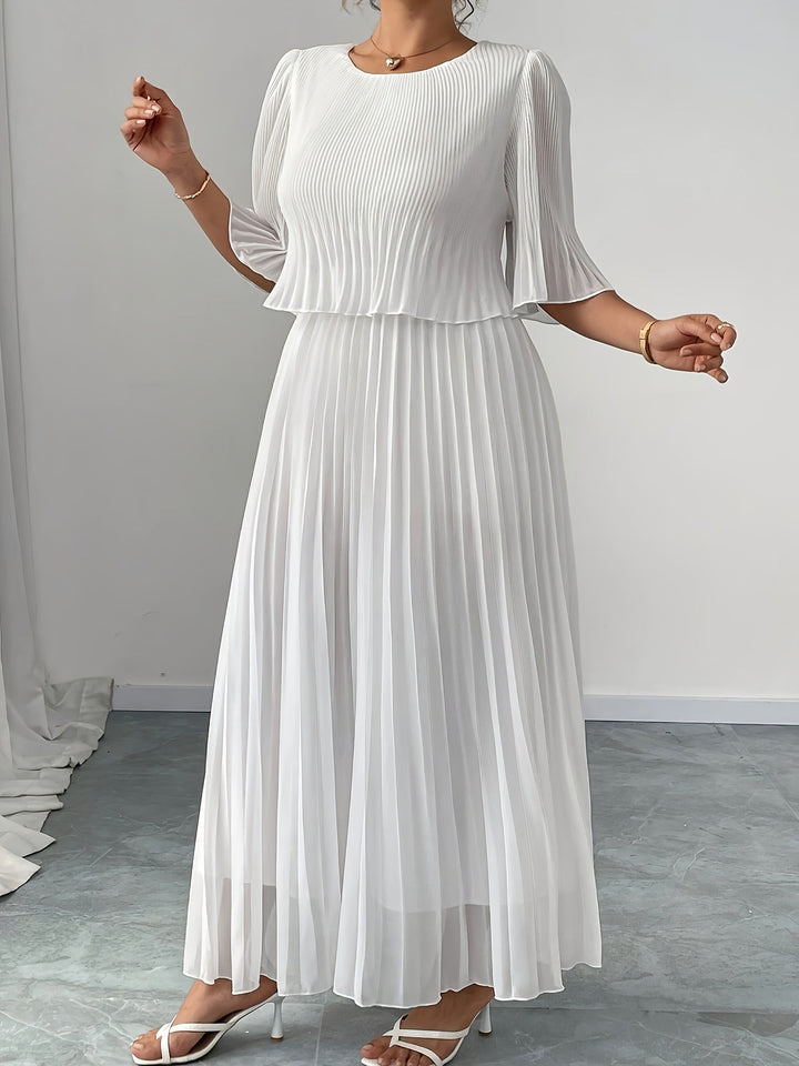 Stunning white A-line maxi dress with delicate pleats, a perfect elegant long formal evening gown for women.