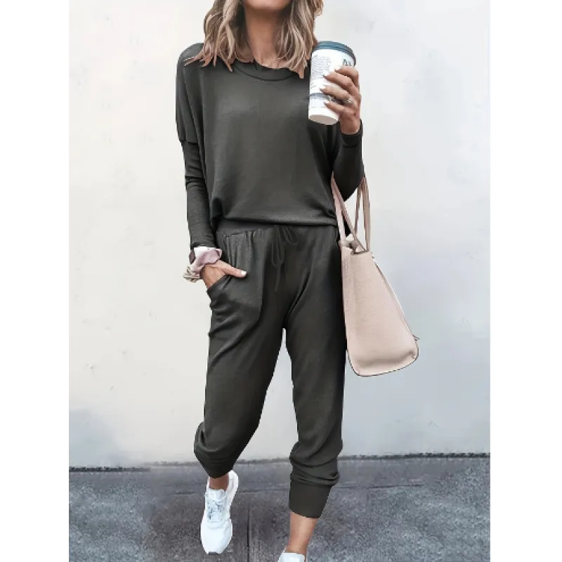 Women's comfortable crew neck jogger set in gray, a stylish two-piece lounge outfit for casual wear.