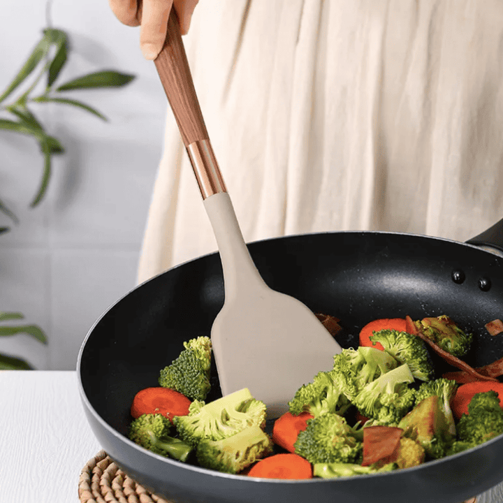 Versatile 10-piece silicone cooking utensil set, ideal for everyday kitchen tasks, baking, and protecting nonstick surfaces.