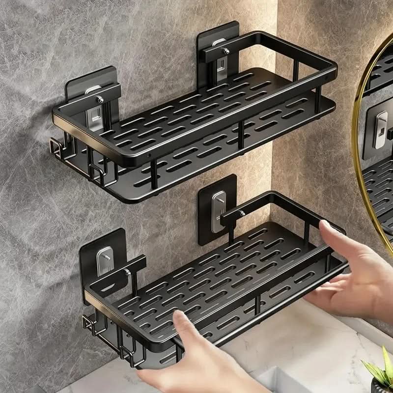 Sleek drill-free adhesive bathroom shelf. Wall-mounted shower caddy for neat storage & organization.