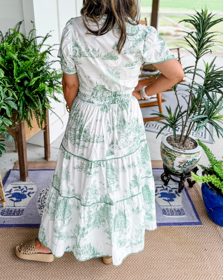 Detailed view of the flattering smocked waist on a women's classic toile maxi dress. Comfortable & stylish.