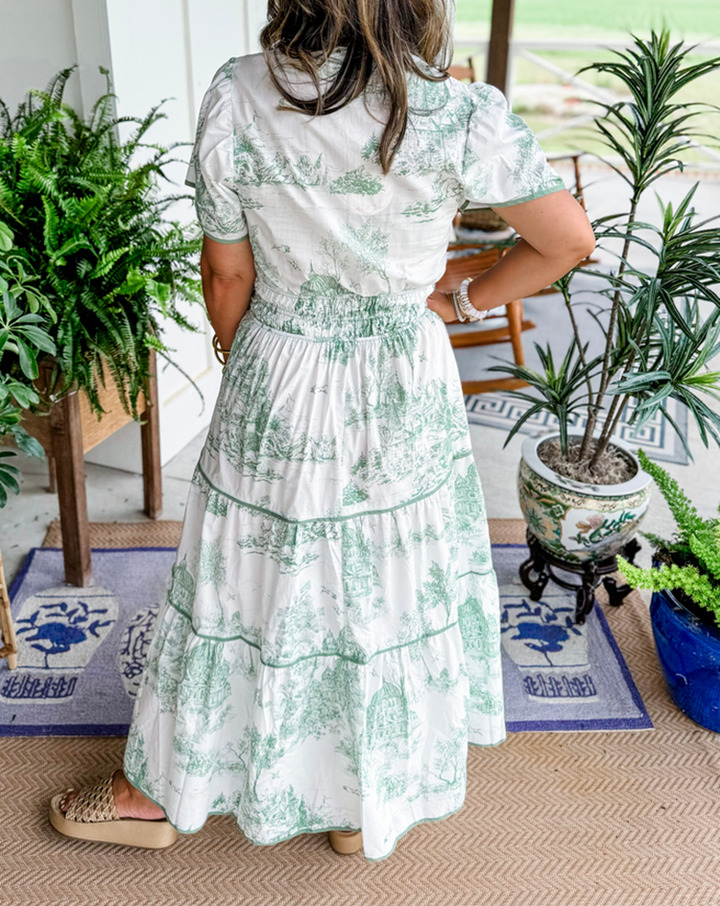 Detailed view of the flattering smocked waist on a women's classic toile maxi dress. Comfortable & stylish.