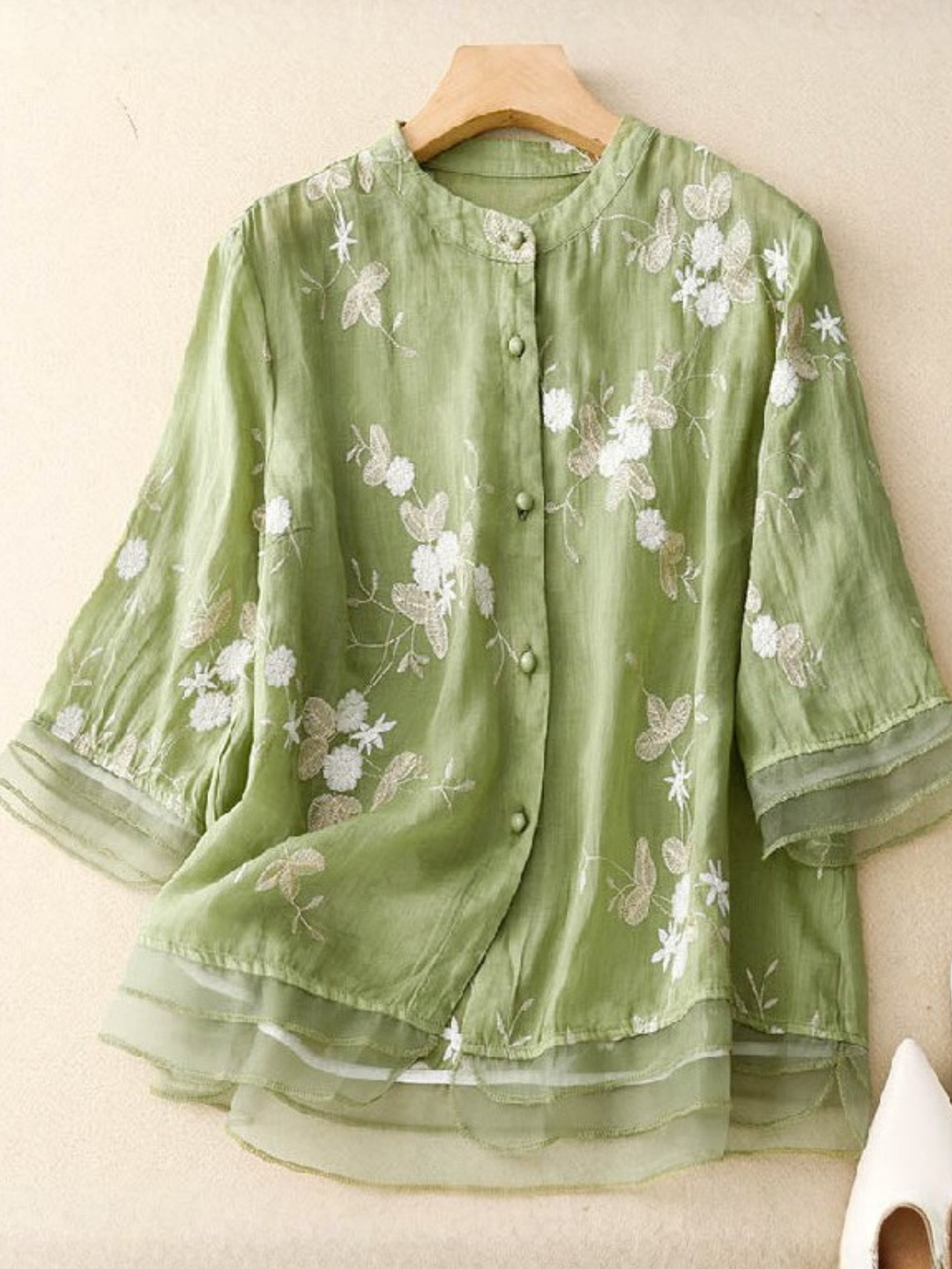 Stylish women's loose-fit long sleeve blouse for casual wear & comfort, button front.