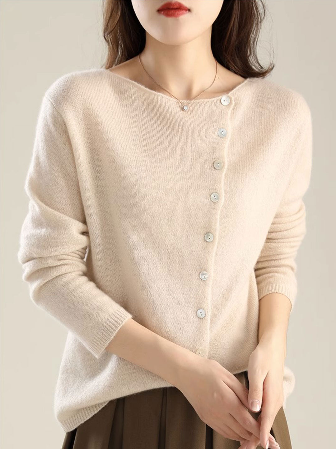 All-season women's cardigan. Versatile, elegant, and cozy knitwear with a relaxed fit for comfort.