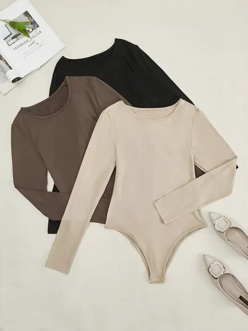New arrival: Women's multi-pack long sleeve crew neck bodysuits for effortless casual elegance.