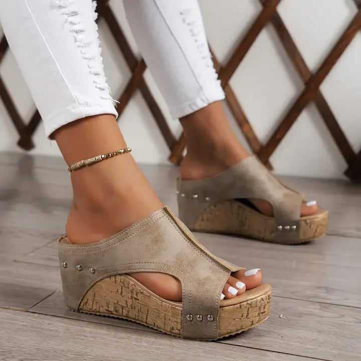 Orthopedic open-toe wedge sandals for women, providing comfortable foot support for walking and casual summer days.
