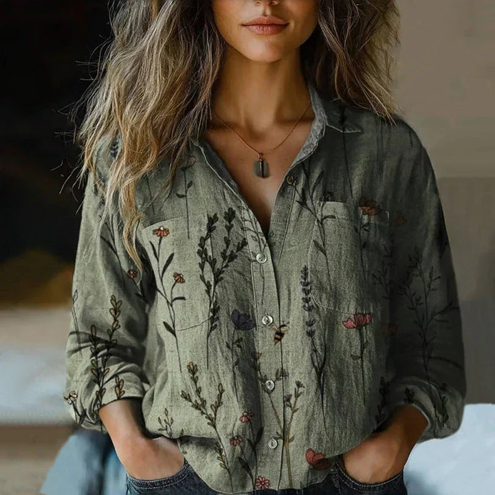 Flowy women's boho top featuring a unique vintage print, ideal for a chic everyday look.