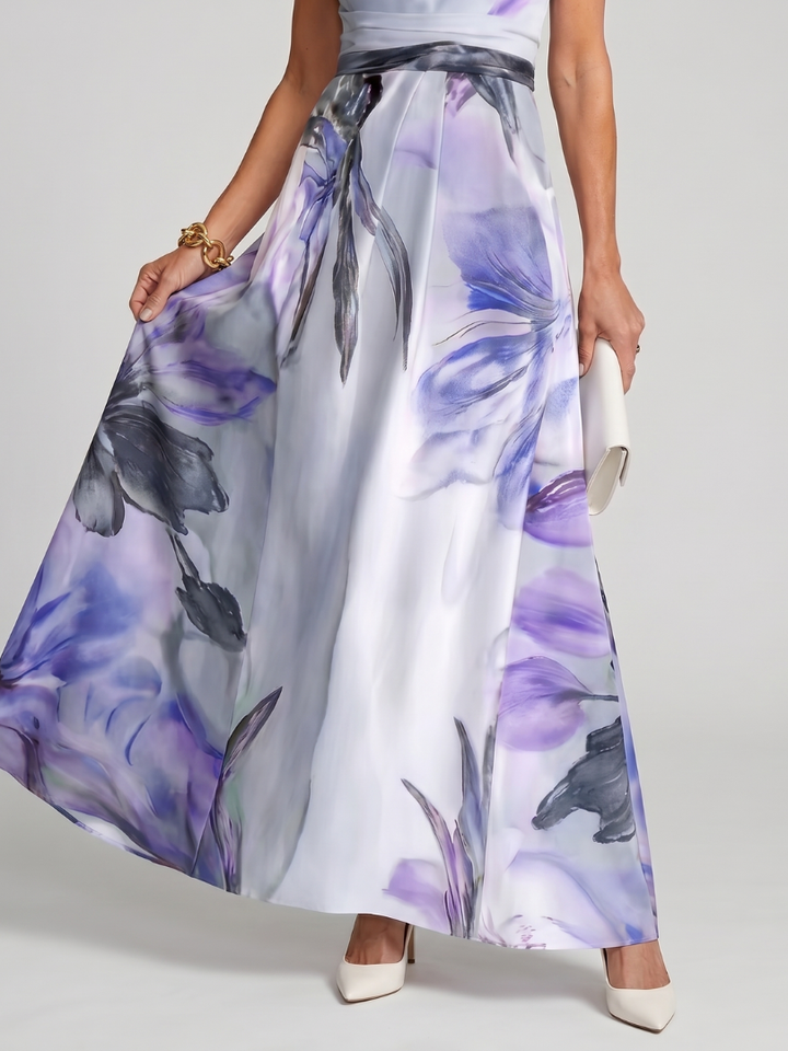 Women's halter maxi dress in motion, showcasing its graceful flowing skirt and sleeveless design.