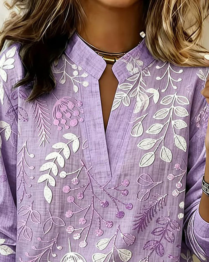 Model wearing a stylish Women's Pastel Floral V-Neck Top, ideal for summer style.