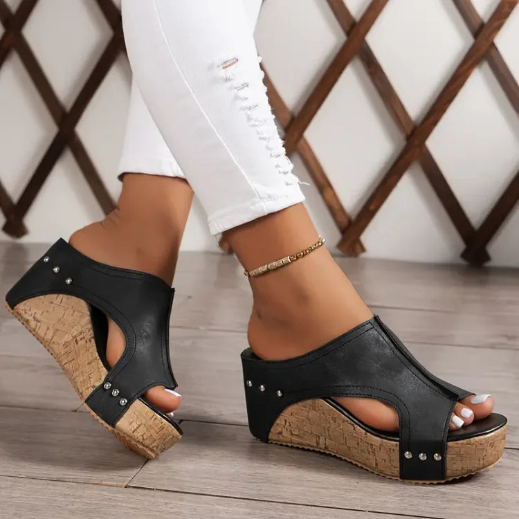 Comfortable women's open-toe wedge sandals with orthopedic foot support, ideal for walking and summer style.
