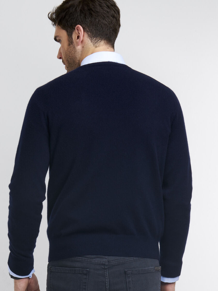 Ultra-soft men's cashmere sweater in deep navy blue, providing ultimate comfort & luxurious feel.