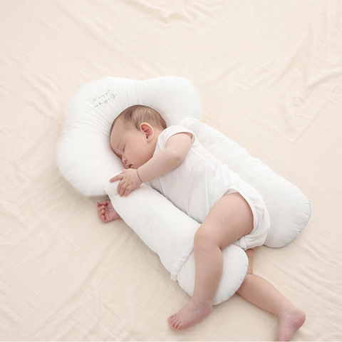 Infant gentle sleep organic cotton U-shape head support pillow for stroller & car seat comfort.