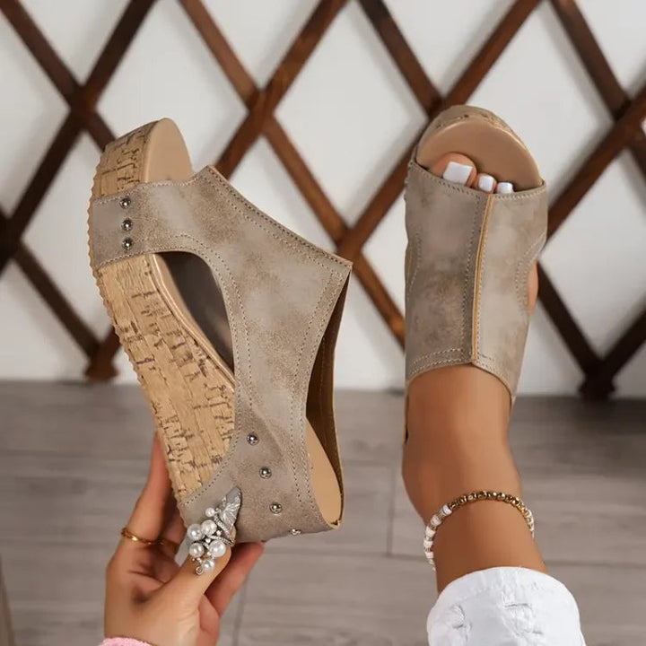 Supportive women's orthopedic wedge sandals for comfortable walking, featuring an open toe and chic summer style.