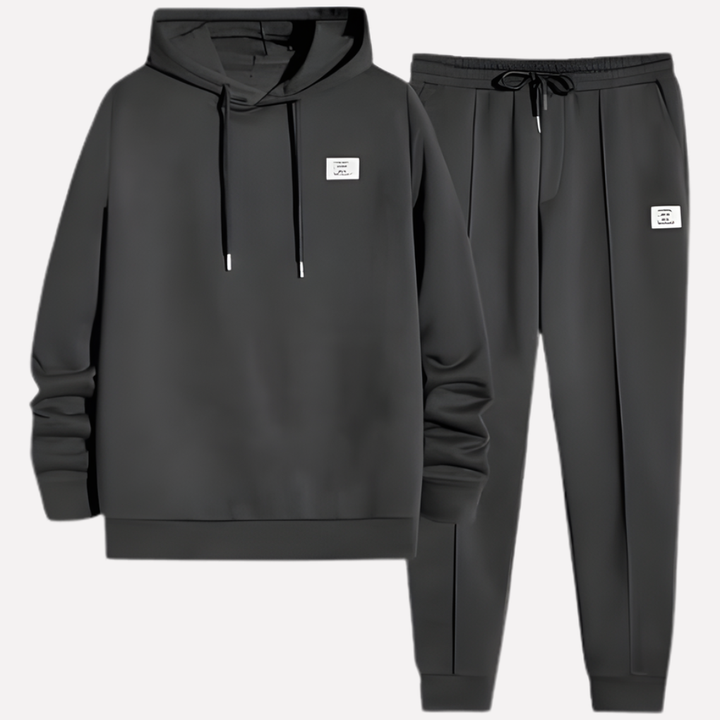 Soft men's cozy hoodie & sweatpants set. A comfortable two-piece tracksuit, perfect men's apparel for relaxation.