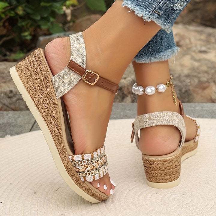 Summer women's sandals with a cushioned wedge platform, closed toe, and chic crossed straps.
