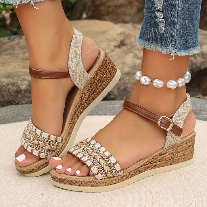 Stylish women's summer sandals: cushioned wedge platform, closed toe & fashionable crossed straps.