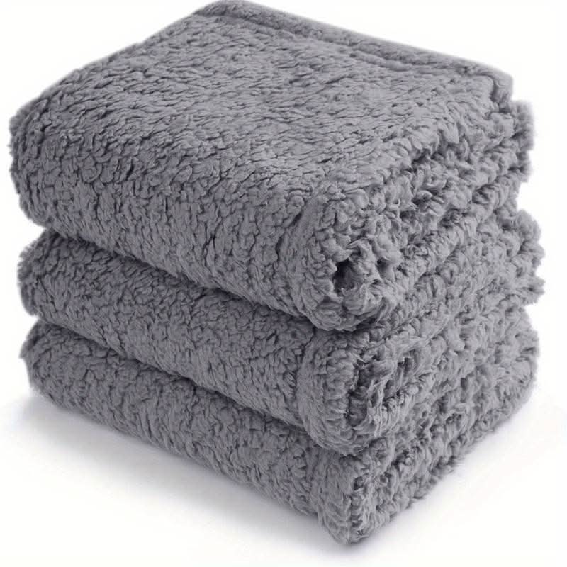 Cozy pet fleece blanket for snuggling. Provides warmth & comfort for your dog or cat. Great for travel.