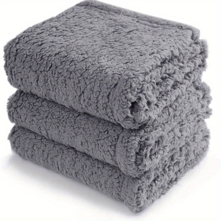 Cozy pet fleece blanket for snuggling. Provides warmth & comfort for your dog or cat. Great for travel.
