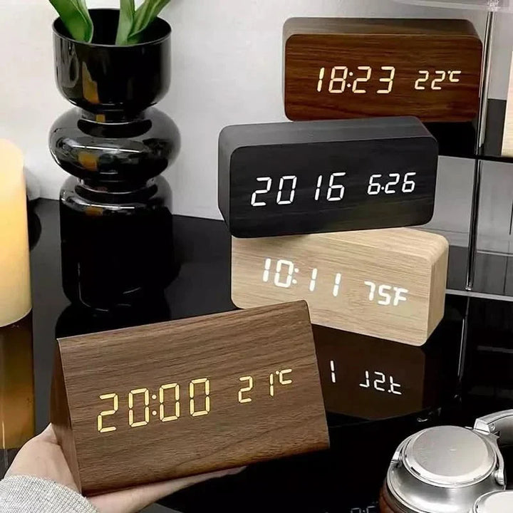 Bedside wooden look LED clock with temperature and dimmable digital display for a cozy bedroom ambiance.