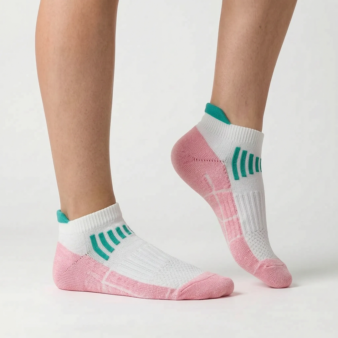 Durable women's running ankle socks. Green athletic performance socks for active workouts.