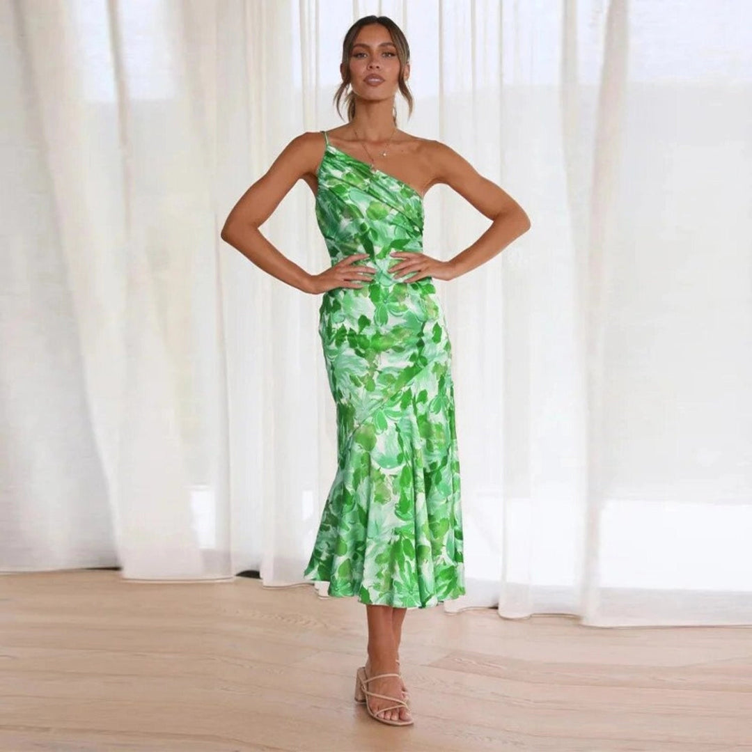 Vibrant floral asymmetric midi dress, a flowing sleeveless design for sophisticated women's fashion.