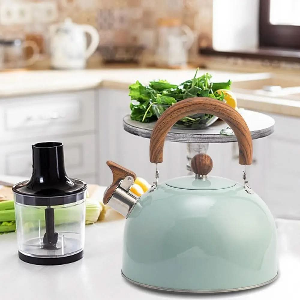Modern 3.2-quart whistling tea kettle in polished stainless steel, a home essential for hot beverages.