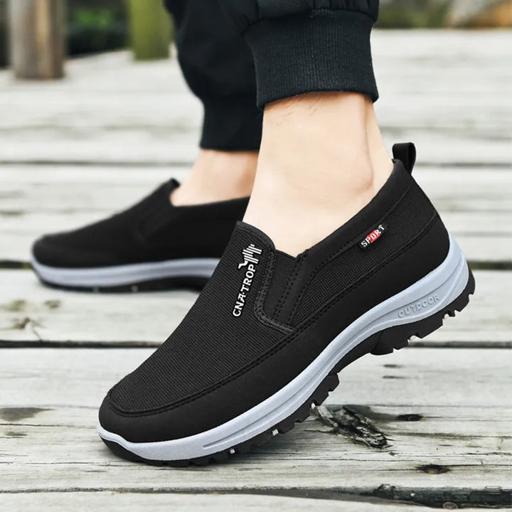 Durable men's supportive walking shoes with advanced cushioning & stability, perfect for long walks, daily wear & active travel.