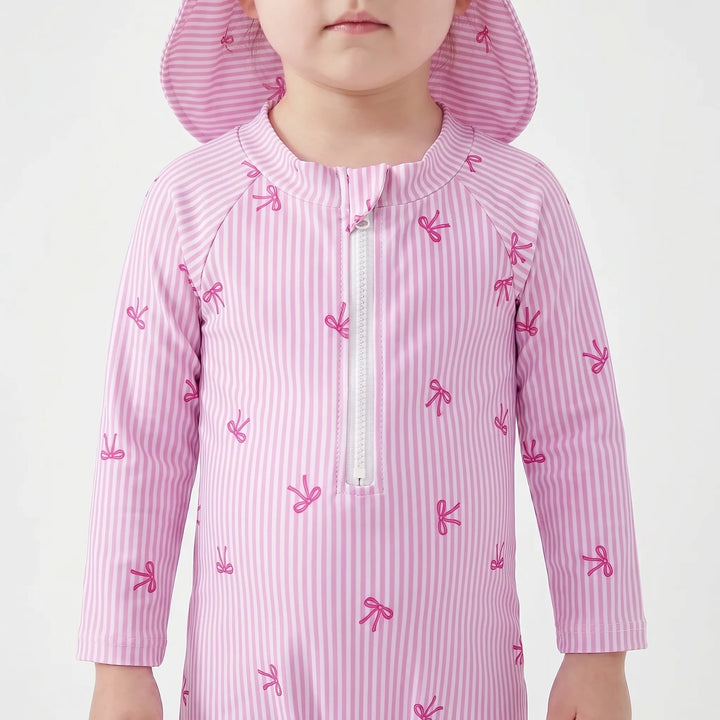 Cute girls' baby rash guard swimsuit & sun hat set, perfect for summer beach fun & pool days. Infant sun protection.