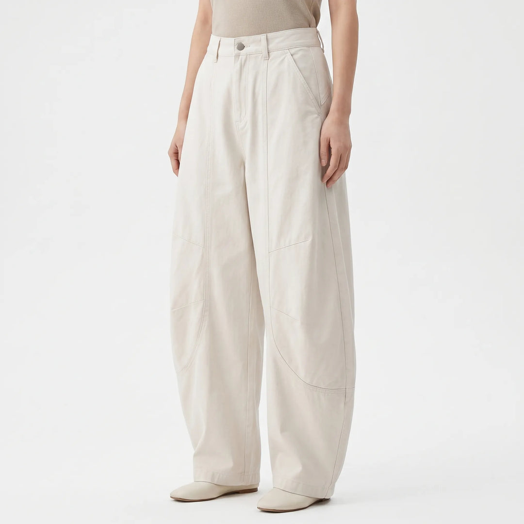 White women's barrel-leg pants, baggy loose fit trousers, perfect for casual or vintage streetwear.