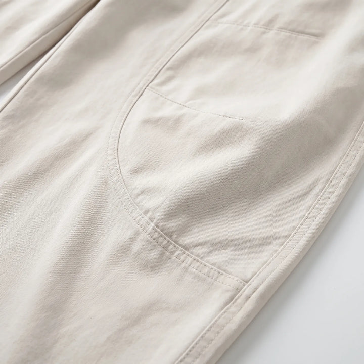 Green women's baggy barrel-leg pants, comfortable loose fit, ideal for relaxed everyday wear.