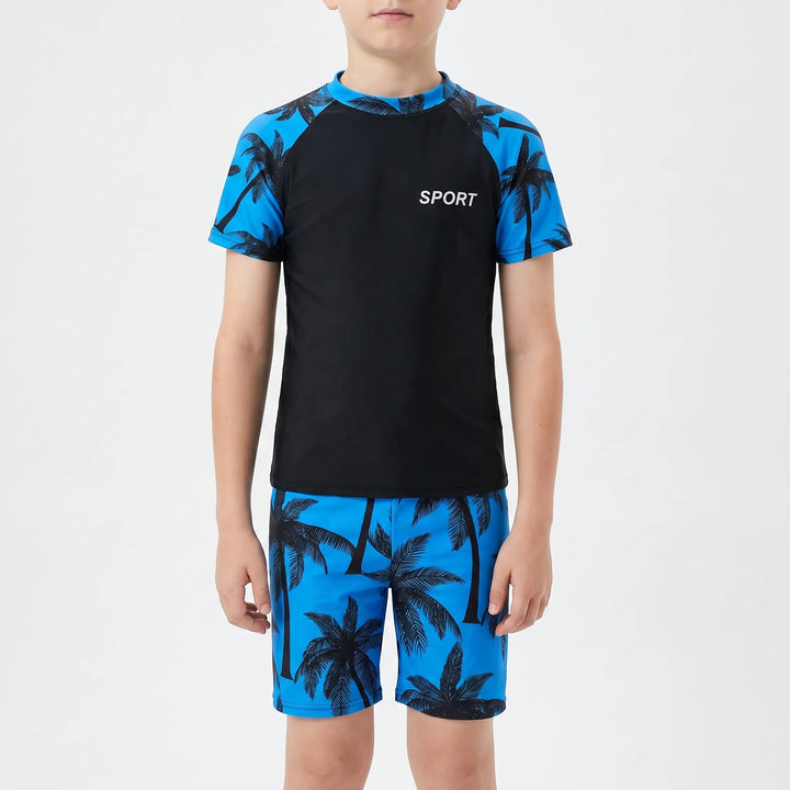 Active boys' two-piece swimsuit. Durable swim shorts & top for kids' summer water adventures & beach play.