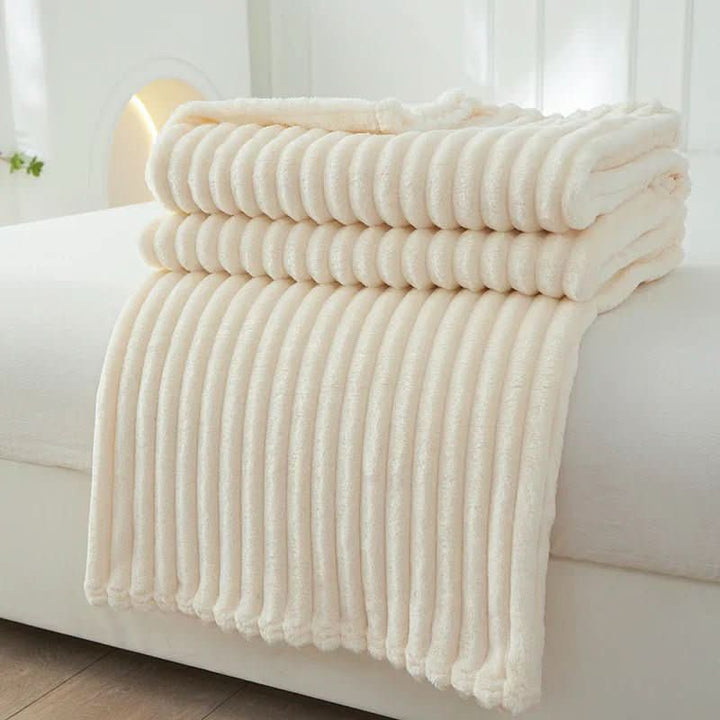 Modern flannel fleece throw blanket, adds soft comfort and warmth to any home decor.